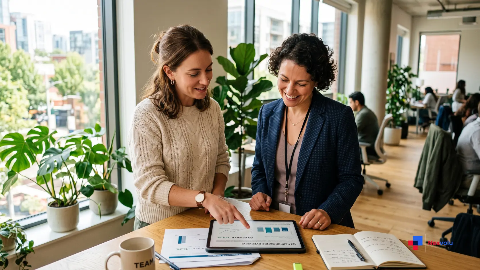 Employee and manager reviewing an AI workplace policy together in a bright office